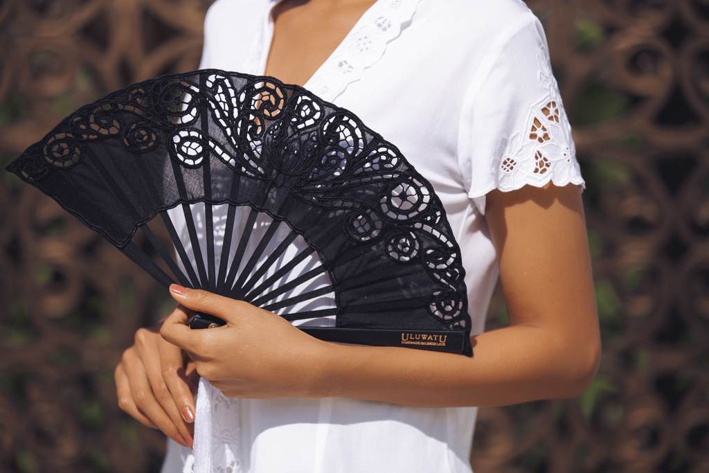 Black and deals white hand fan