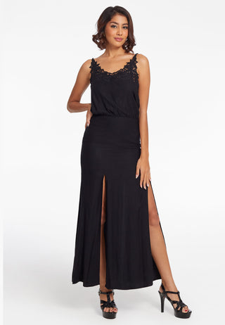  Beautiful long sleeveless strap dress with v-neck line. The soft rayon satin dress has elastic at waistline, slits for easy movement and is decorated with intricate handmade lace work. This particular piece is  in black.