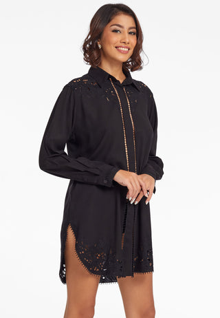  Shirt style summer dress in finest fabric and long length. It has curved hemline, handcrafted lace work, hidden buttons and is black in colour. 