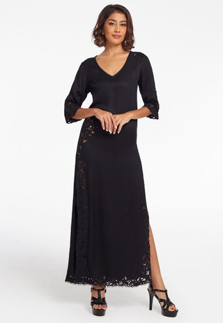 Simple and elegant long dress ideal for summer in comfortable fabric. It has long loose sleeves, a v neck design and has slits at the sides for easy movement. Handmade Balinese lace embroidery work at right places is adding beauty. its colour is black. 