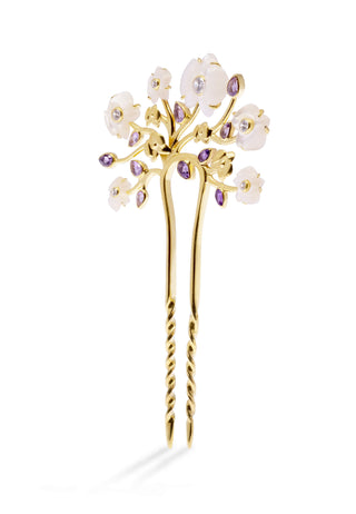 Hair accessory representing the exotic flower orchid carved in seashell with white-golden colour and coloured stone in 14 carat gold-plated silver. An intricated handcrafted Balinese creation to add to your charm.