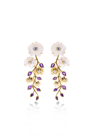 Anggrek chandelier earring, a representation of the exotic flower orchid carved in seashell with white-golden colour and coloured stone in 14 carat gold-plated silver. 